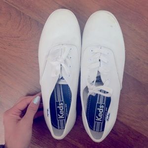 White keds lace up sneakers